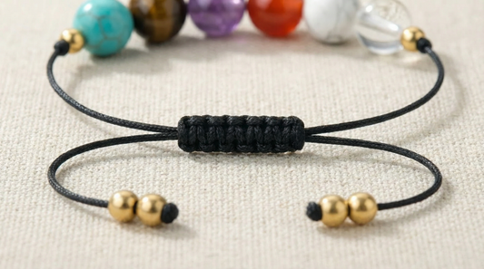 Adjustable cord back support bracelet with Amazonite, Tiger’s Eye, Lepidolite, Carnelian, Howlite and Selenite