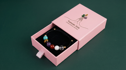 Unisex wellness bracelet designed to support back tension and posture awareness