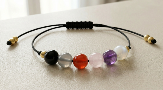 Six-gemstone school support bracelet with Moonstone, Rose Quartz, Fluorite, Amethyst, Carnelian and Obsidian on black adjustable cord