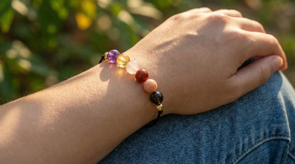 Unisex emotional recovery bracelet with warm purple, gold, pink, red and smoky neutral stones